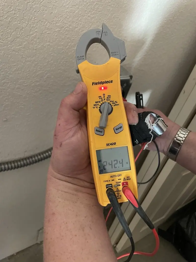 Voltage testing with clamp meter during Aluminum Wiring Replacement in Kaysville